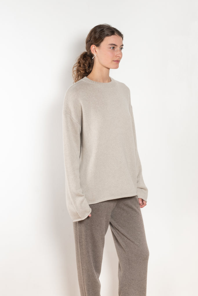 The Kristy Sweater by Lisa Yang is a 5 gauge cashmere relaxed knit with a longline silhouette and crewneck crafted in a heavy knit cashmere with a textured hand feel