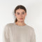 The Kristy Sweater by Lisa Yang is a 5 gauge cashmere relaxed knit with a longline silhouette and crewneck crafted in a heavy knit cashmere with a textured hand feel