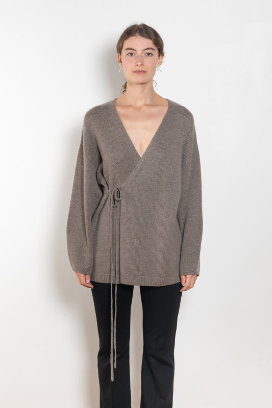 The Laurina Wrap Cardigan is a refined and feminine cashmere knit wrap cardigan with a tied waist