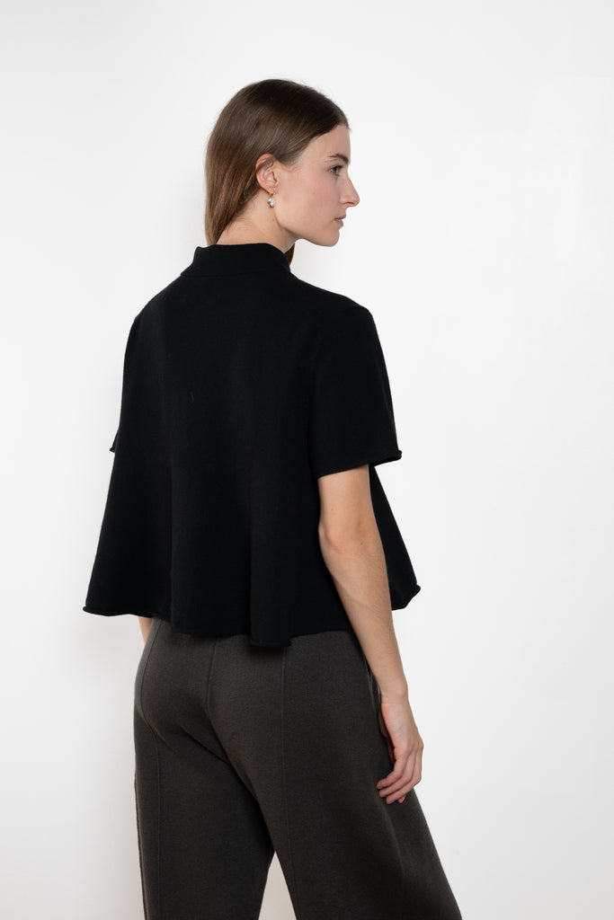 The Leith Top by Lisa Yang designed with a relaxed silhouette, it features a pointed collar, short sleeves, and subtly dropped shoulders that create a modern yet timeless look