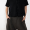 The Leith Top by Lisa Yang designed with a relaxed silhouette, it features a pointed collar, short sleeves, and subtly dropped shoulders that create a modern yet timeless look