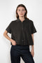 The Leith Top by Lisa Yang designed with a relaxed silhouette, it features a pointed collar, short sleeves, and subtly dropped shoulders