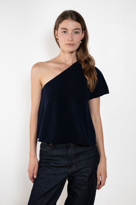 The Livana Top by LISA YANG reimagines everyday knitwear with a modern, asymmetrical silhouette.