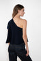 The Livana Top by LISA YANG reimagines everyday knitwear with a modern, asymmetrical silhouette.