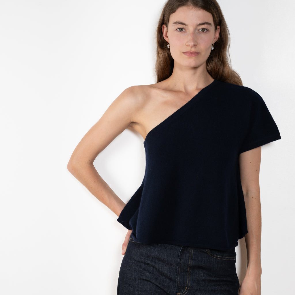 The Livana Top by LISA YANG reimagines everyday knitwear with a modern, asymmetrical silhouette.