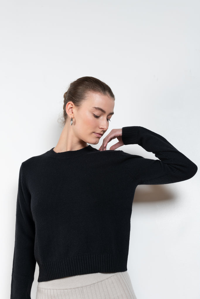 The Mable Sweater by Lisa Yang is a signature fitted cashmere sweater with ribbed trims, a comfortable round neck and long sleeves