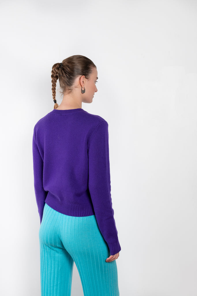 The Mable Sweater by Lisa Yang is a signature fitted cashmere sweater with ribbed trims, a comfortable round neck and long sleeves