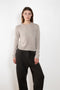 The Mable Sweater by Lisa Yang is crafted in transitional, mid-weight cashmere to an understated expression