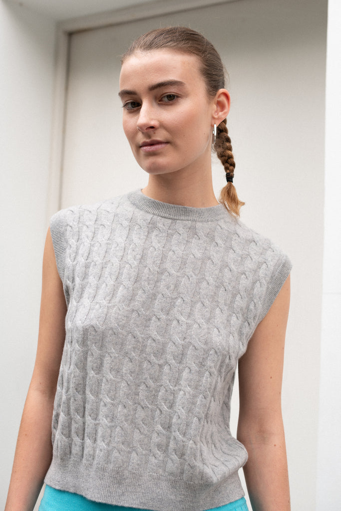 The Miko Vest by Lisa Yang is a soft cable knit sleeveless top with a fitted shape in a soft and luxurious cashmere