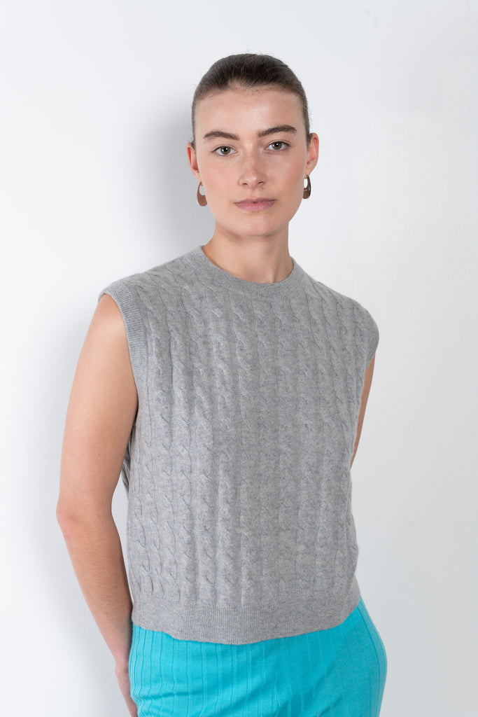The Miko Vest by Lisa Yang is a soft cable knit sleeveless top with a fitted shape in a soft and luxurious cashmere