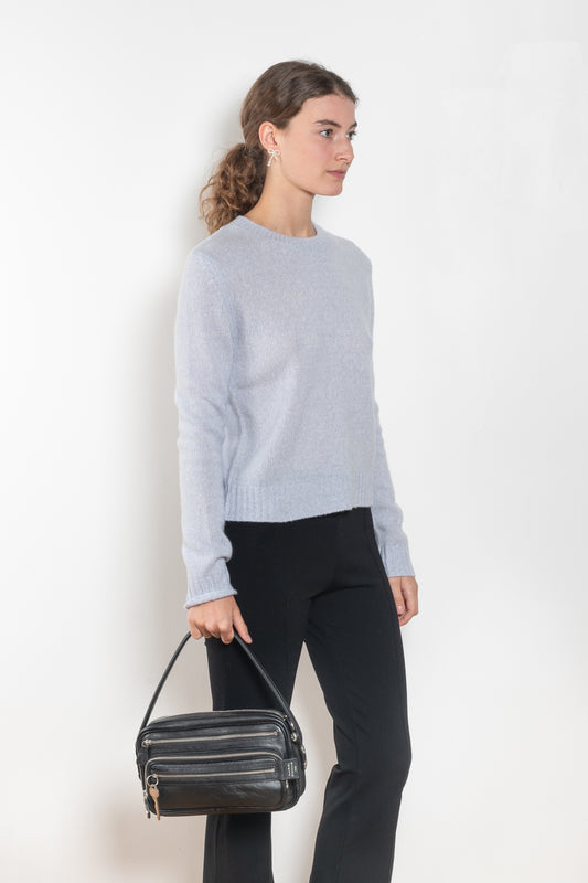 The Mira Sweater by Lisa Yang is a round neck sweater in a soft textured cashmere silk blend with a light and lofty hand feel.