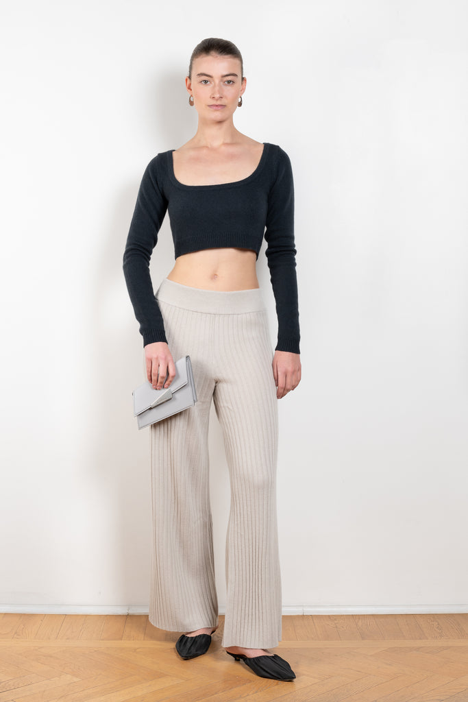 The Monty Top by Lisa Yang is a cropped cashmere top with  scoop neck and long fitted sleeves