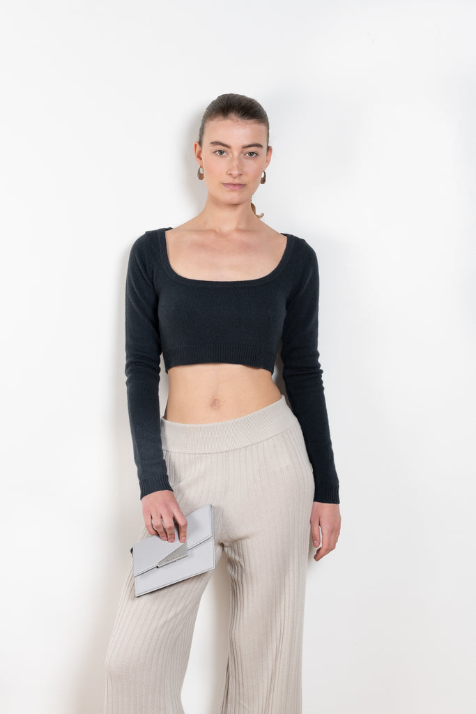 The Monty Top by Lisa Yang is a cropped cashmere top with  scoop neck and long fitted sleeves