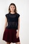 The Nian Vest by Lisa Yang is a lightweight knit crafted from a luxurious blend of cashmere and silk