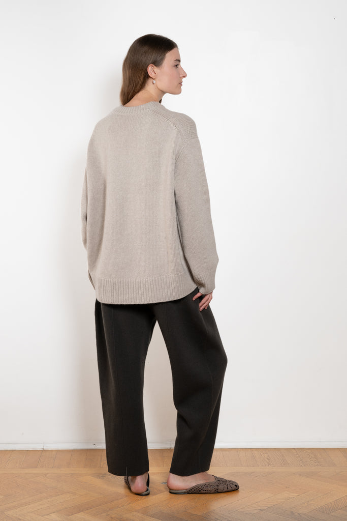 The Noor Sweater by Lisa Yang features a ribbed neck, dropped shoulders, oversized profile.