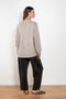 The Noor Sweater by Lisa Yang features a ribbed neck, dropped shoulders, oversized profile.