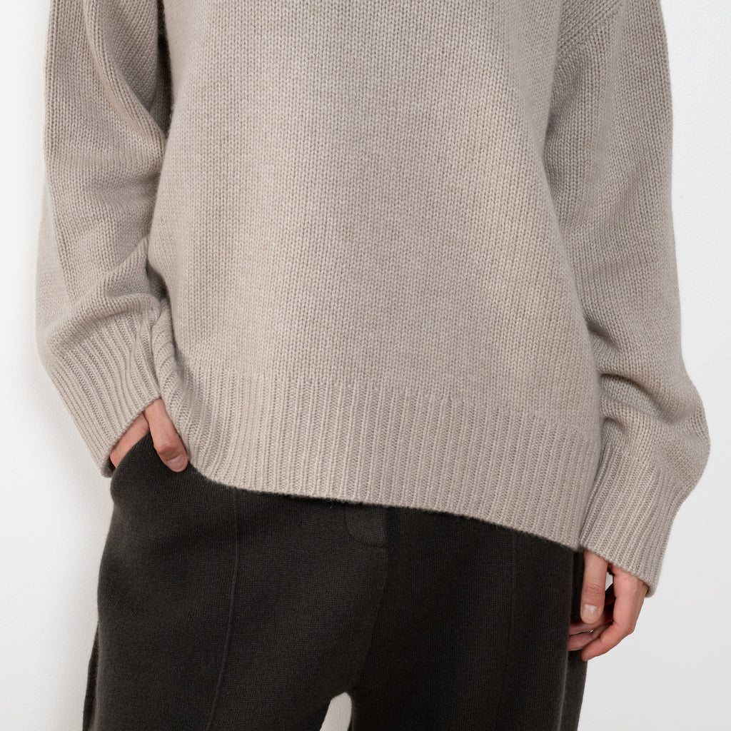 The Noor Sweater by Lisa Yang features a ribbed neck, dropped shoulders, oversized profile.