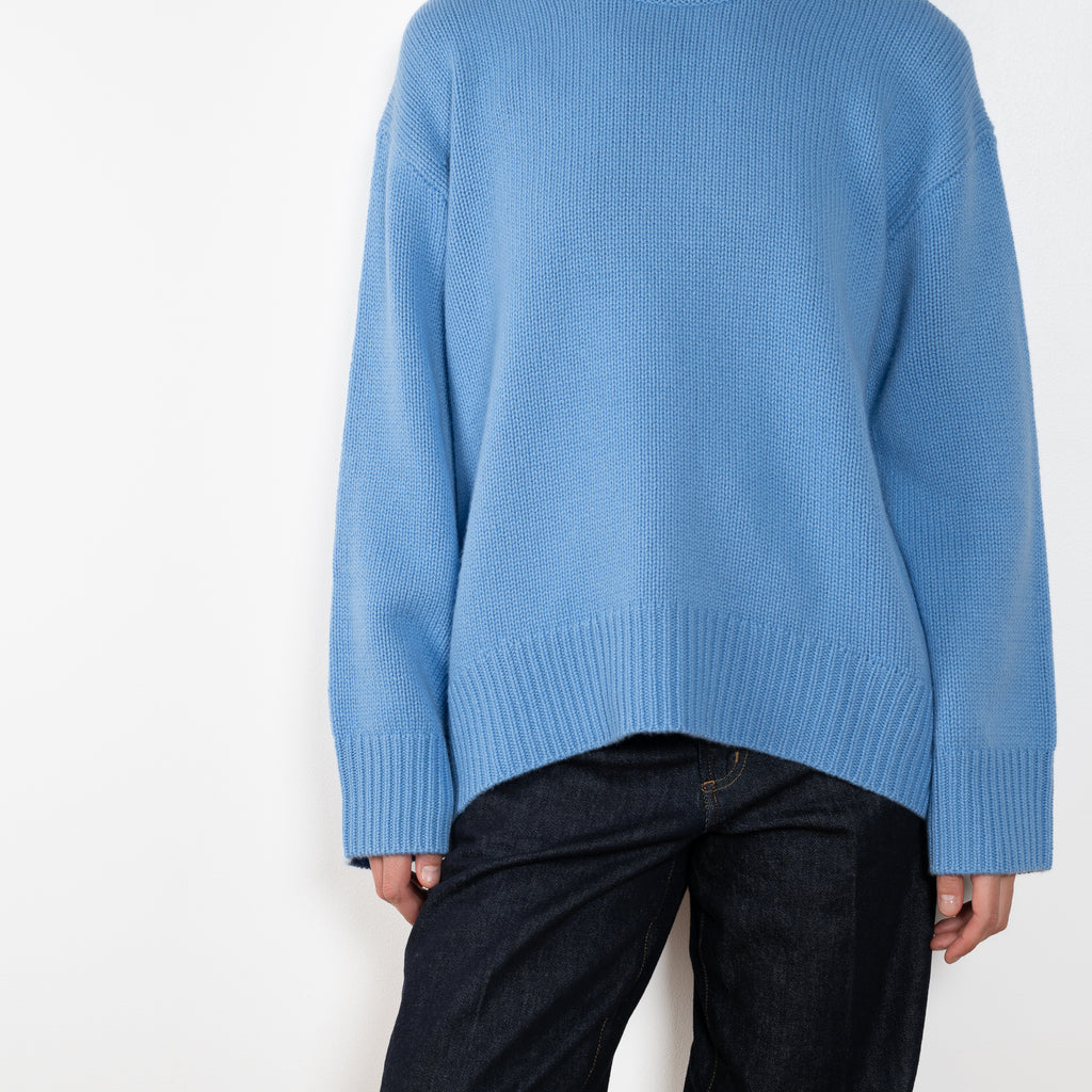 The Noor Sweater by Lisa Yang features a ribbed neck, dropped shoulders, oversized profile.