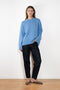 The Noor Sweater by Lisa Yang features a ribbed neck, dropped shoulders, oversized profile.