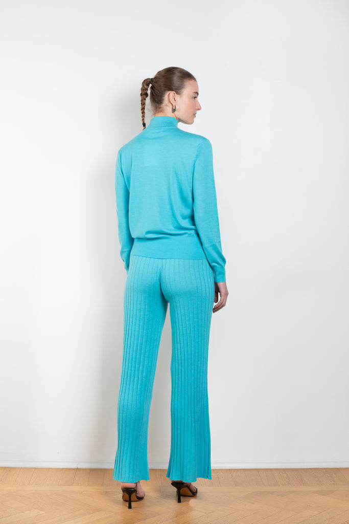 The Ophelia Sweater by Lisa Yang is a fine cashmere knit with a fitted shape and high neck