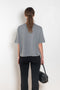 The Rubie Tee by Lisa Yang is a fine knit cashmere t-shirt with a classic round neck
