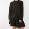 The Seymour Sweater by Lisa Yang with its soft cashmere quality, which moulds comfortably to your skin.