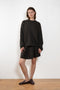 The Seymour Sweater by Lisa Yang with its soft cashmere quality, which moulds comfortably to your skin.
