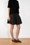 The Wren Skirt by Lisa Yang embodies Lisa Yang's brand motif, which refers to the soft and gentle feeling of the fiber.