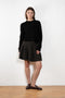 The Wren Skirt by Lisa Yang embodies Lisa Yang's brand motif, which refers to the soft and gentle feeling of the fiber.