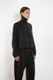 The Zerlina Sweater by Lisa Yang is a timeless cashmere turtleneck with a relaxed, effortless silhouette
