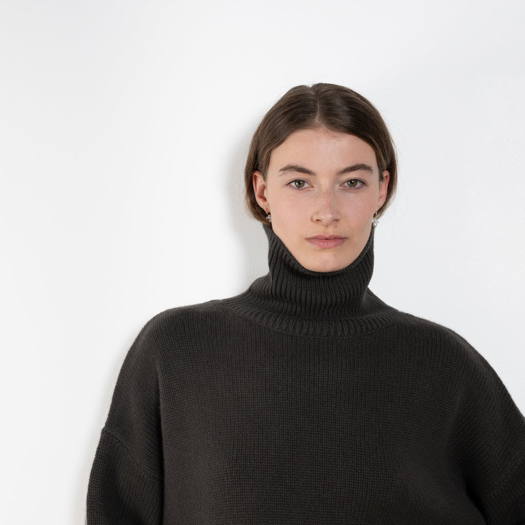 The Zerlina Sweater by Lisa Yang is a timeless cashmere turtleneck with a relaxed, effortless silhouette