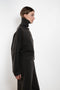 The Zerlina Sweater by Lisa Yang is a timeless cashmere turtleneck with a relaxed, effortless silhouette
