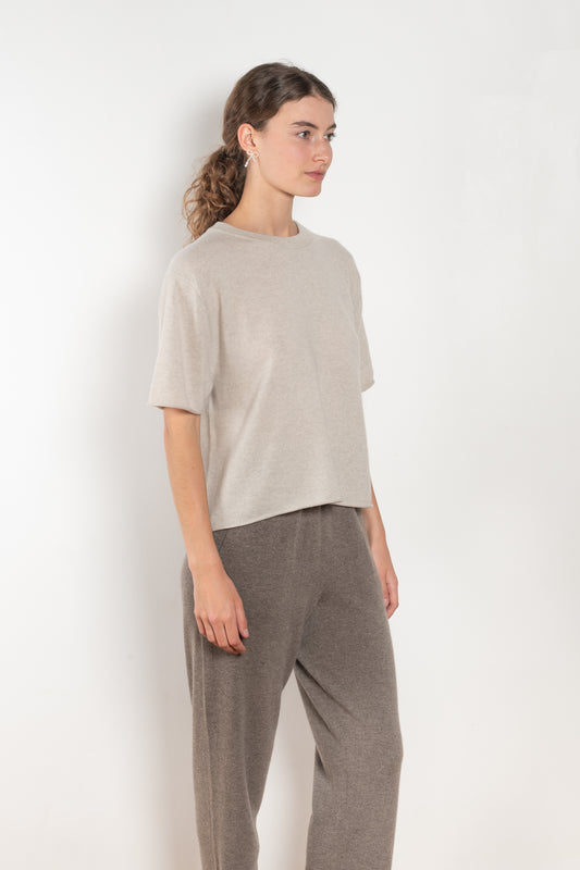 The Cila Tee by LISA YANG is a fine knit cashmere t-shirt with a classic round neck and rolled trim edges
