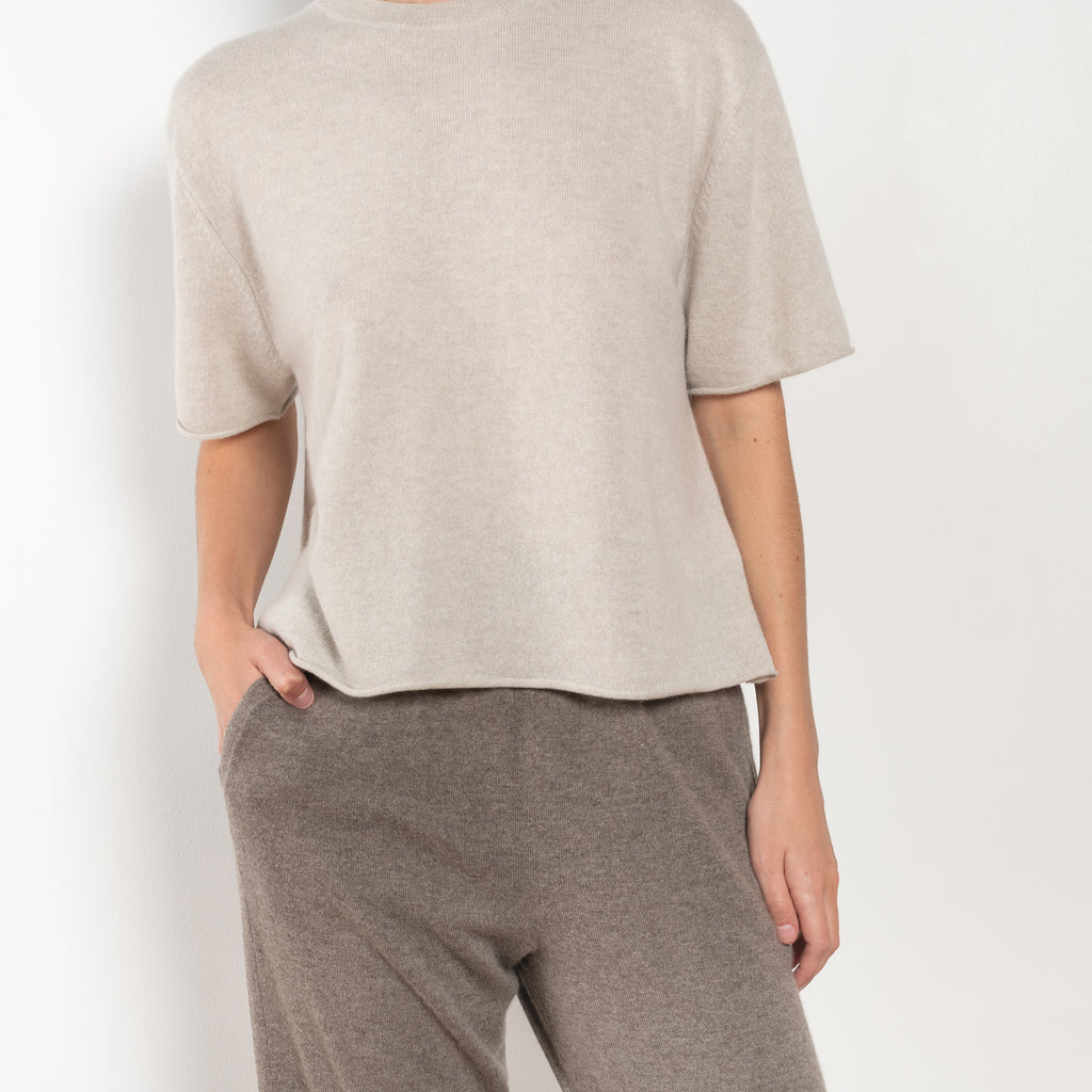 The Cila Tee by LISA YANG is a fine knit cashmere t-shirt with a classic round neck and rolled trim edges