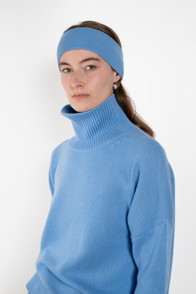 The Heidi Sweater by Lisa Yang&nbsp;is crafted in rich, heavy knit cashmere. The cocooning silhouette is made more inviting by an enveloping high neck, dropped shoulders, full-length sleeves