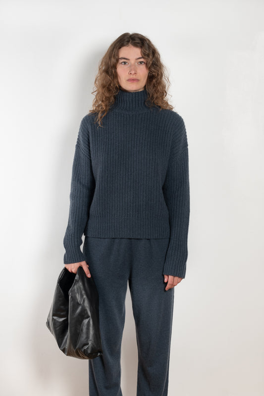 The Julina Sweater by LISA YANG is a chuncky cashmere ribbed sweater with a high neck and straight fit