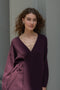 The Laurina Wrap Cardigan is a refined and feminine cashmere knit wrap cardigan with a tied waist