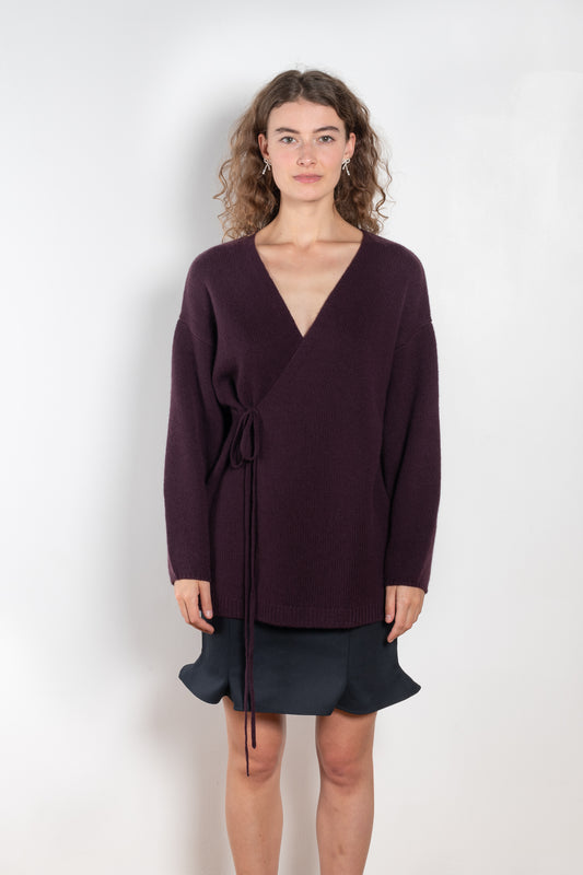 The Laurina Wrap Cardigan is a refined and feminine cashmere knit wrap cardigan with a tied waist