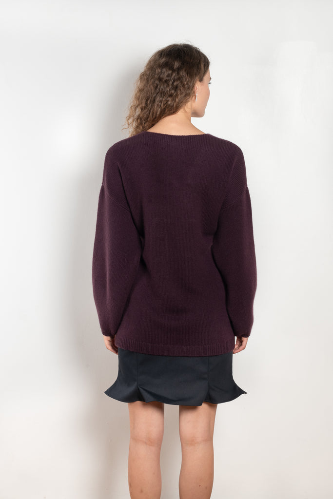 The Laurina Wrap Cardigan is a refined and feminine cashmere knit wrap cardigan with a tied waist