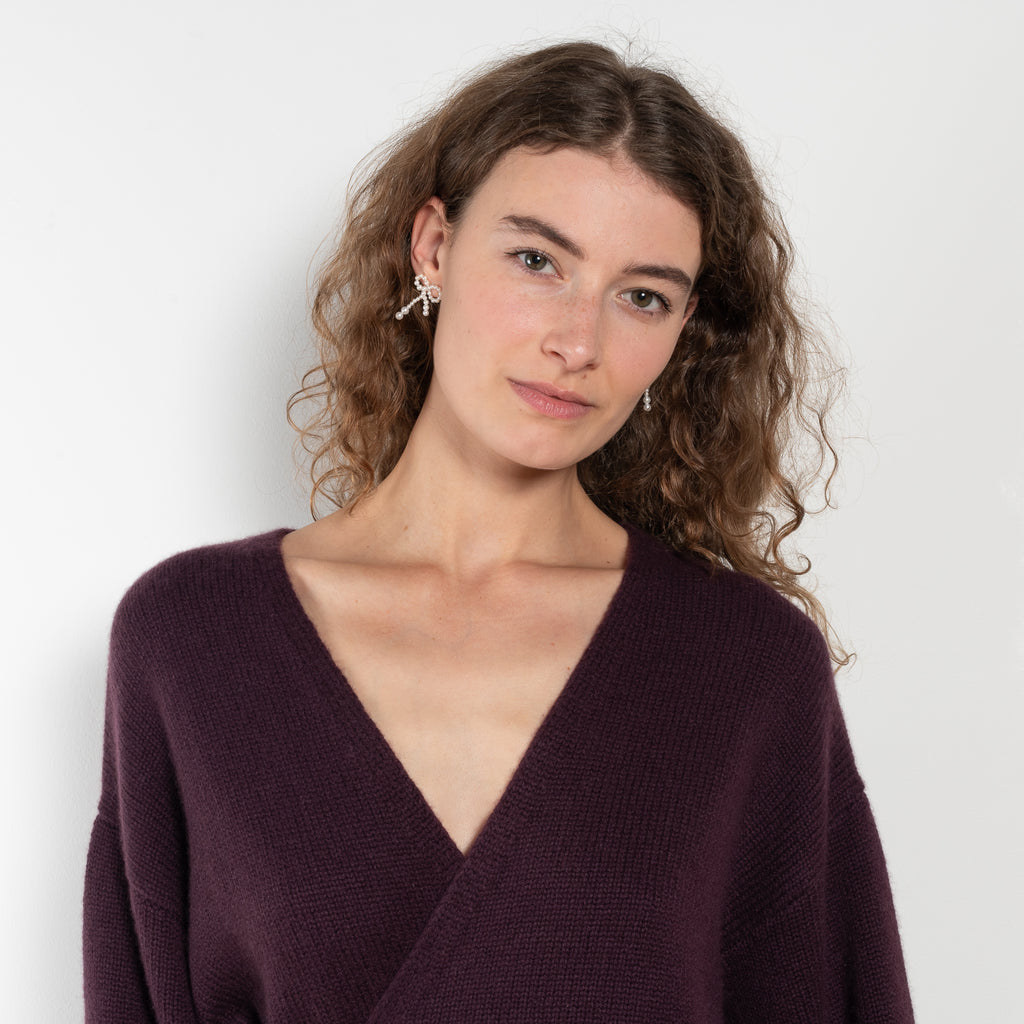 The Laurina Wrap Cardigan is a refined and feminine cashmere knit wrap cardigan with a tied waist