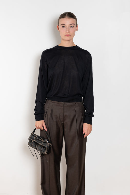 The Angus Sweater by Loulou Studio is fine cashmere knit with a round neck and effortless body, the perfect layering piece.