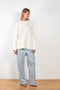 The Aranos Sweater by Loulou Studio is a relaxed sweater with a loose fit and check pattern in a soft cashmere