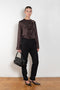 The Azae Blouse by Loulou Studio is a refined silk twill blouse with a draped detail and hardware embellishment