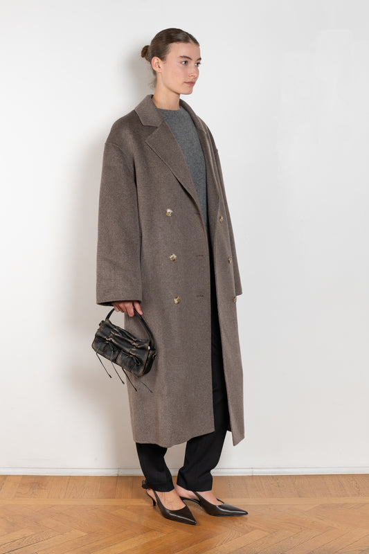 The Borneo Coat by Loulou Studio is an oversized double breasted coat in a soft and warm wool and cashmere blend