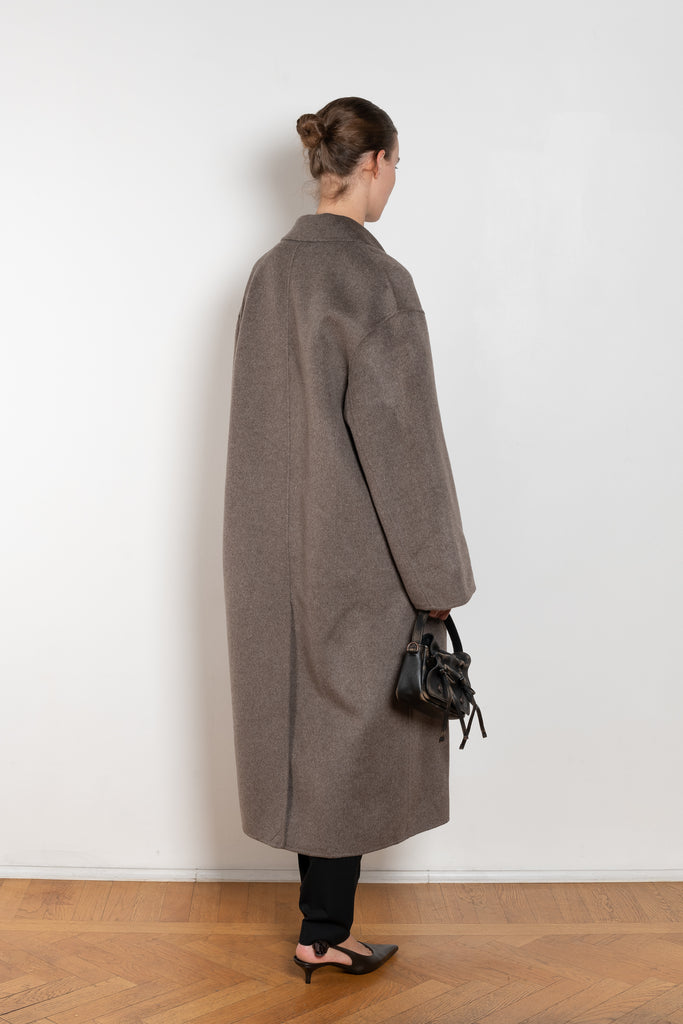 The Borneo Coat by Loulou Studio is an oversized double breasted coat in a soft and warm wool and cashmere blend
