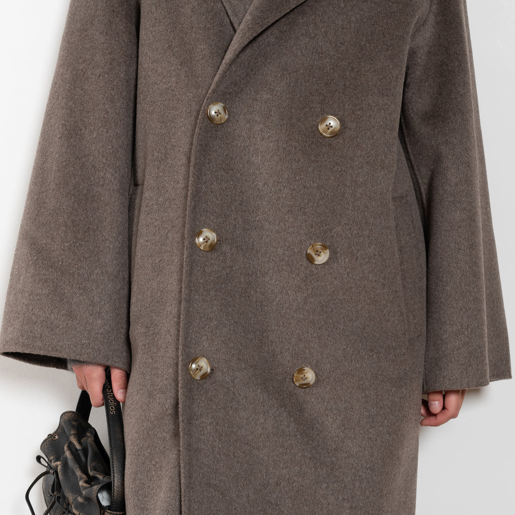 The Borneo Coat by Loulou Studio is an oversized double breasted coat in a soft and warm wool and cashmere blend