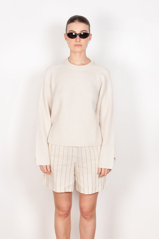 The Carvi Sweater by Loulou Studio is a rib-knit cashmere sweater