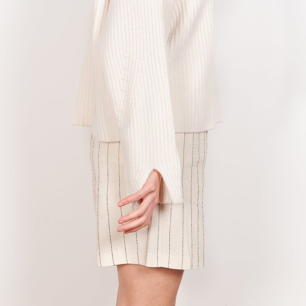 The Carvi Sweater by Loulou Studio is a rib-knit cashmere sweater