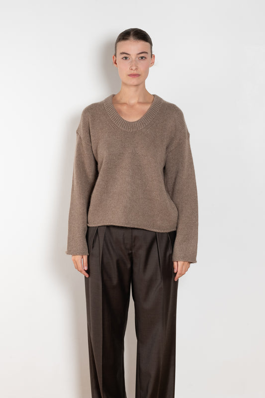 The Derry Sweater by Loulou Studio is an relaxed sweater with an ample fit, a deep U, dropped shoulders and ribbed details in a thicker cashmere