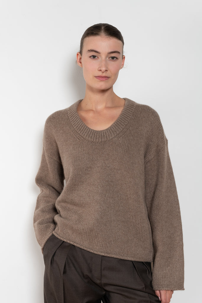 The Derry Sweater by Loulou Studio is an relaxed sweater with an ample fit, a deep U, dropped shoulders and ribbed details in a thicker cashmere